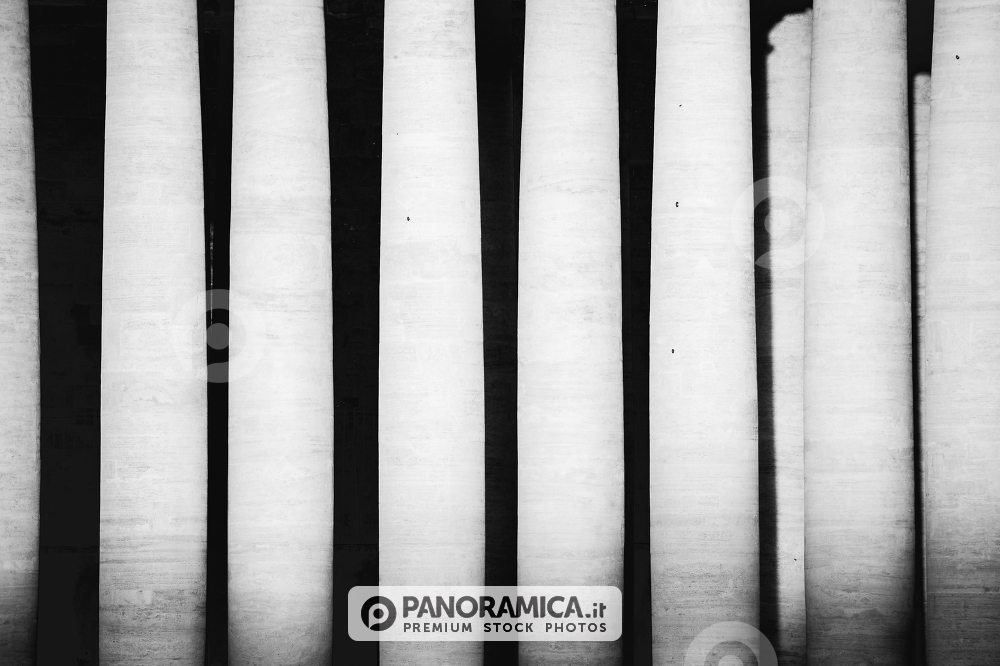A fine art shot of Columns in Saint Peter Square, near the Basilica of Saint Peter in Rome, Italy