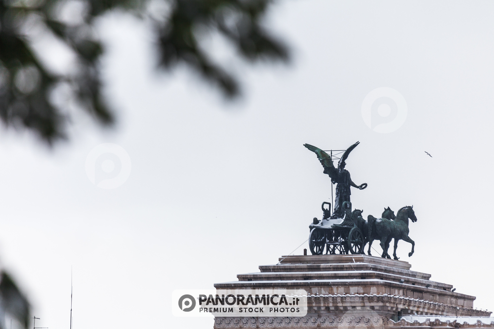 A lovely day of snow in Rome, Italy, 26th February 2018: a beautiful view of Altare della Patria near the Colosseum under the snow