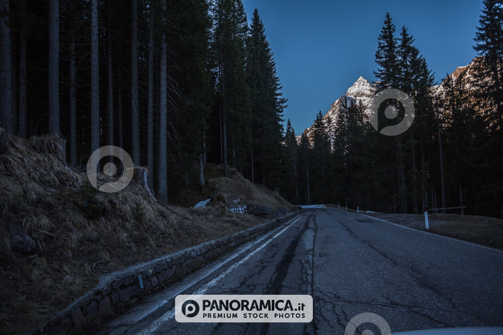 A view of the road to arrive in Rolle Pass, near Pale di San Martino, Paneveggio Natural Park, Dolomites, Italy