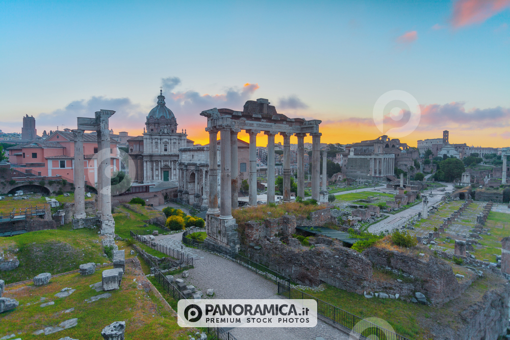 Photography of the Roman Forums with the Temple of Saturn and the Church of the Saints Luca and Martina, in Rome, Italy