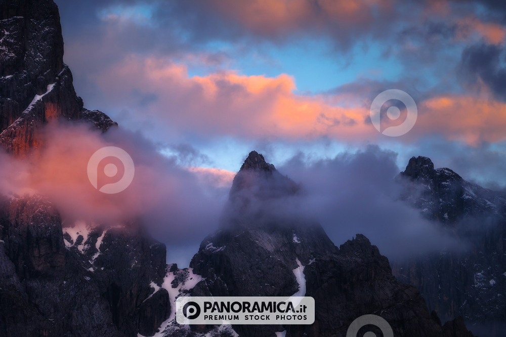Sass Maor peak arounded by clouds, Pale di San Martino, Dolomites, Trentino Alto Adige, Italy