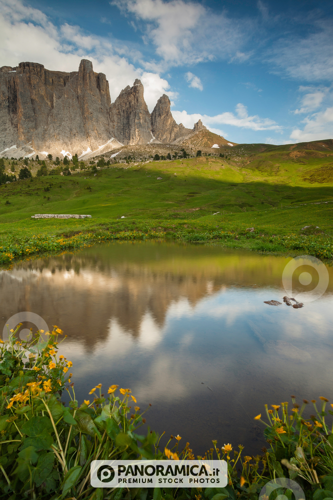 Sella Towers reflected in a typical mountain lake, Sella Pass, Dolomites, Trentino Alto Adige, Italy