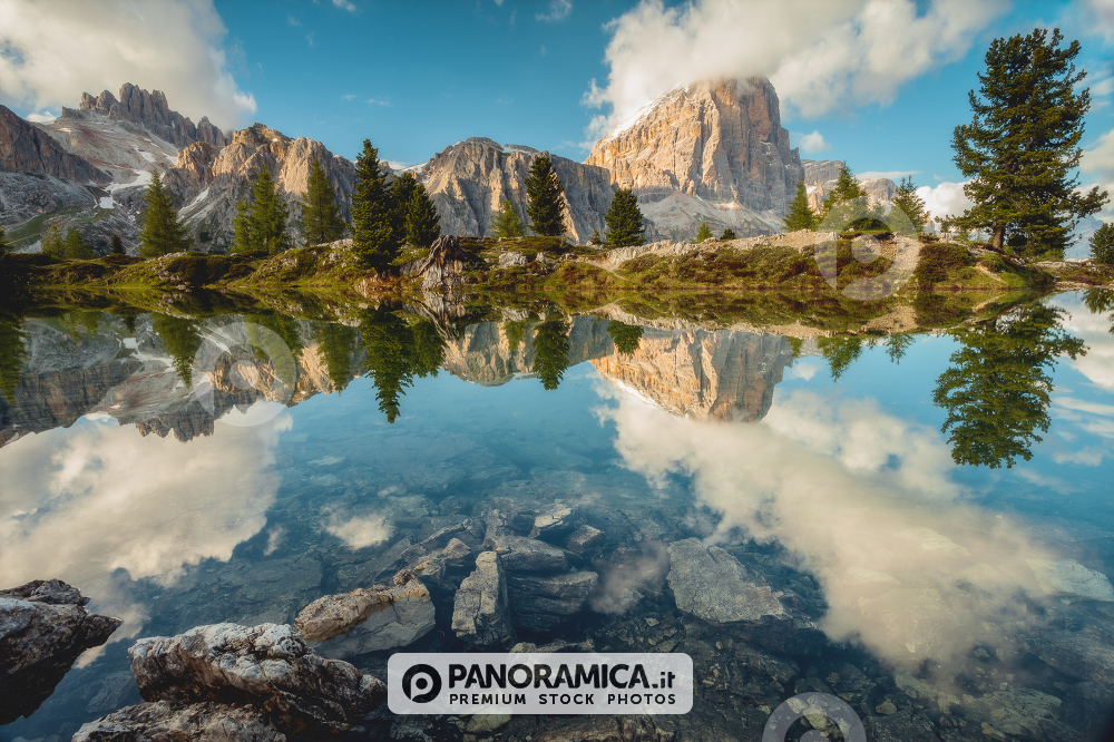 Tofana di Rozes reflected in the alpine Lake Limedes, Falzarego Pass, Dolomites, Veneto, Italy