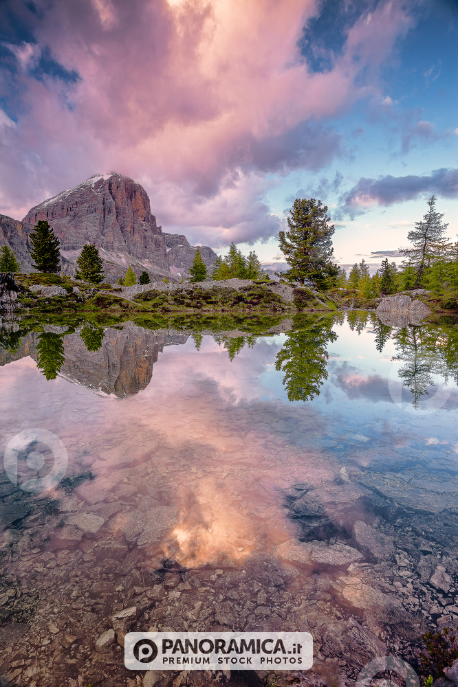Tofana di Rozes reflected in the alpine Lake Limedes, Falzarego Pass, Dolomites, Veneto, Italy