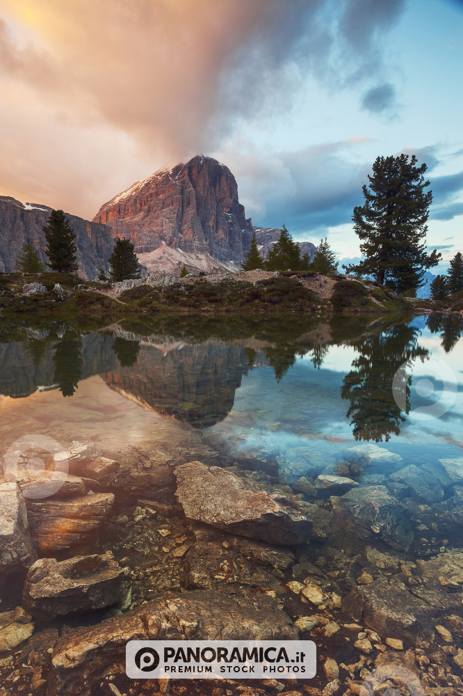 Tofana di Rozes reflected in the alpine Lake Limedes, Falzarego Pass, Dolomites, Veneto, Italy