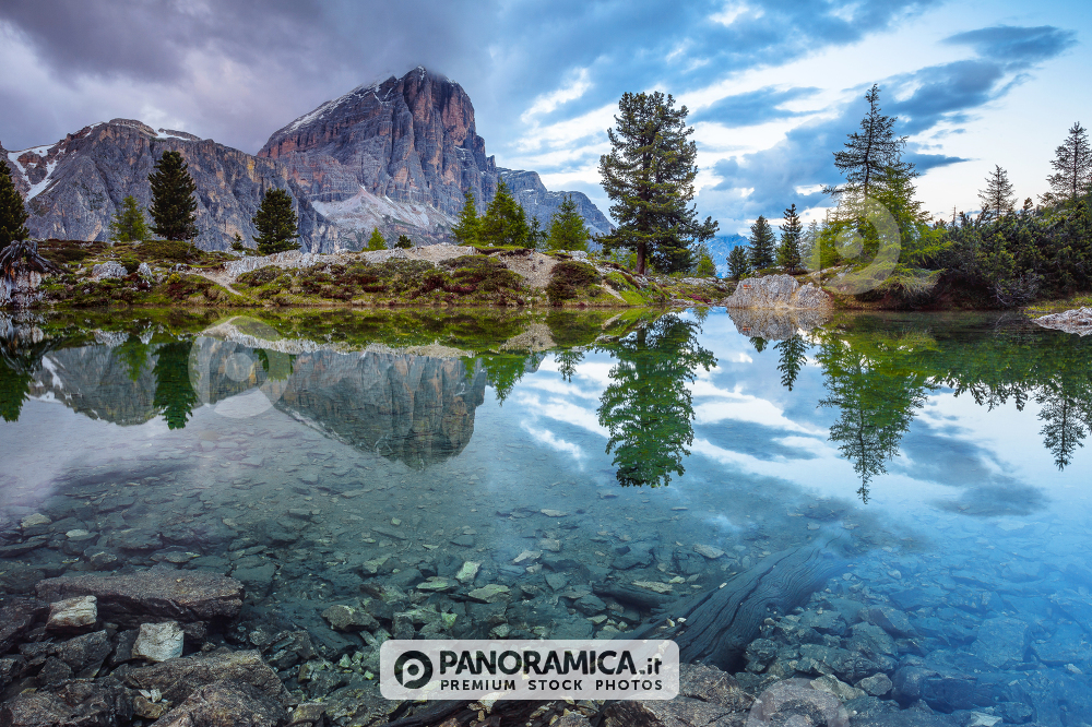 Tofana di Rozes reflected in the alpine Lake Limedes, Falzarego Pass, Dolomites, Veneto, Italy